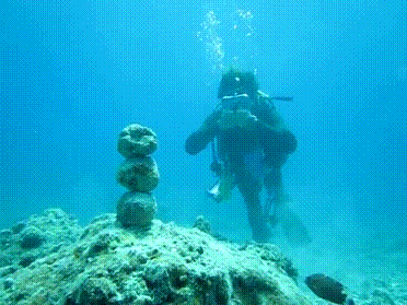 scuba diver taucher tauchen air luft ring steine stones